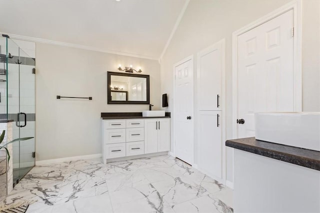 full bathroom featuring marble finish floor, baseboards, ornamental molding, and a stall shower