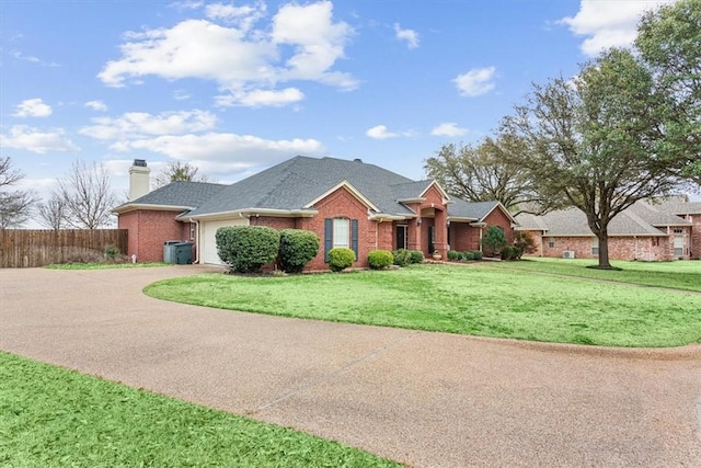 view of front of home with a garage, fence, concrete driveway, and brick siding