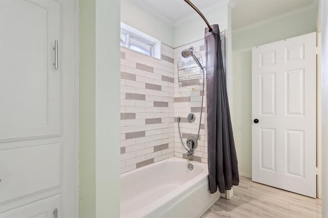 full bath with shower / tub combo, crown molding, and wood finished floors