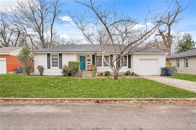 single story home featuring a garage and a front yard