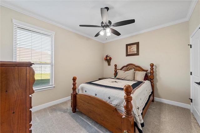 bedroom with light carpet, ceiling fan, and crown molding