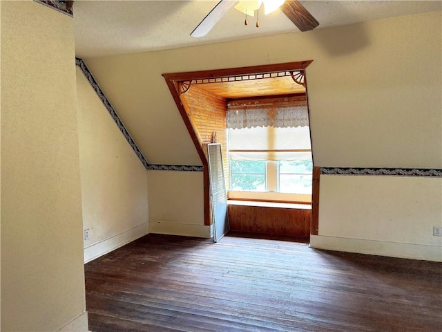 interior space featuring ceiling fan and dark hardwood / wood-style flooring