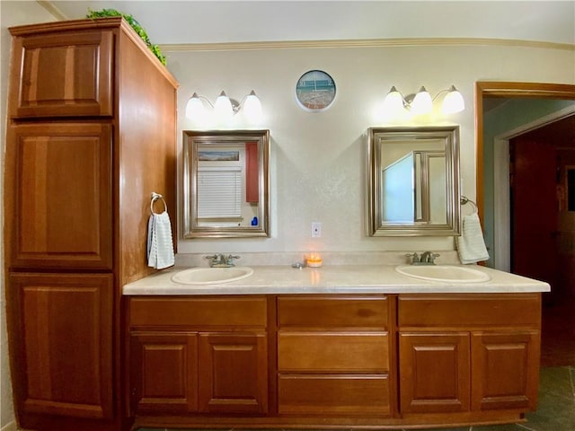 bathroom with vanity and ornamental molding