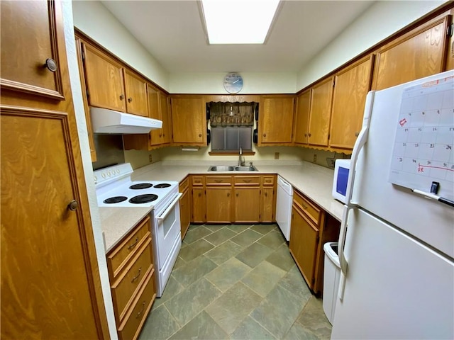 kitchen with white appliances and sink