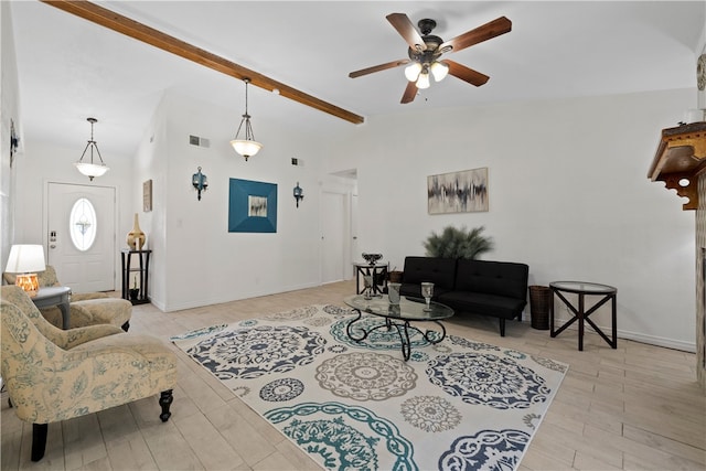 living room with ceiling fan and lofted ceiling with beams