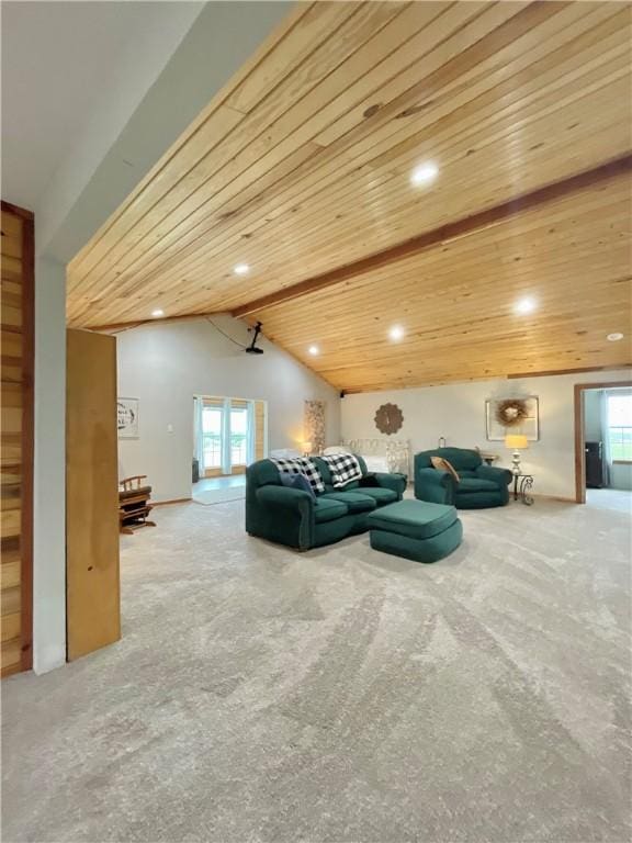 carpeted living room with lofted ceiling with beams and wooden ceiling