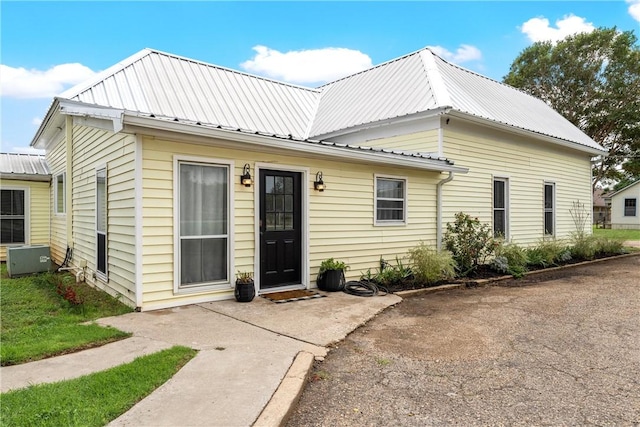 view of front of house featuring central AC