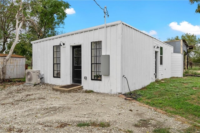 view of outdoor structure with ac unit