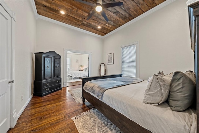 bedroom featuring dark hardwood / wood-style flooring, ceiling fan, crown molding, and wood ceiling