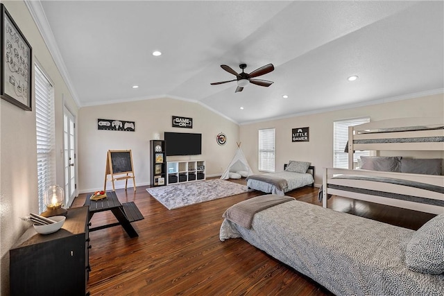 bedroom with ceiling fan, dark hardwood / wood-style flooring, vaulted ceiling, and ornamental molding