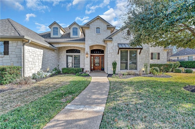 view of front of home with a front lawn