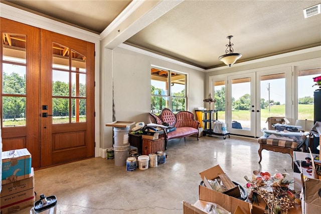 sunroom featuring french doors and plenty of natural light