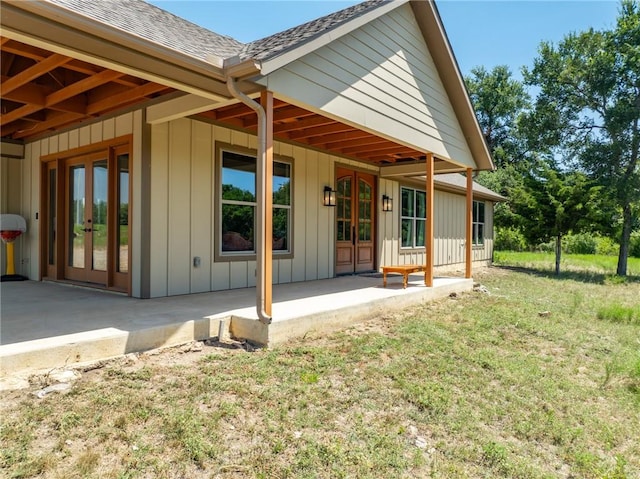 rear view of house with a patio and french doors