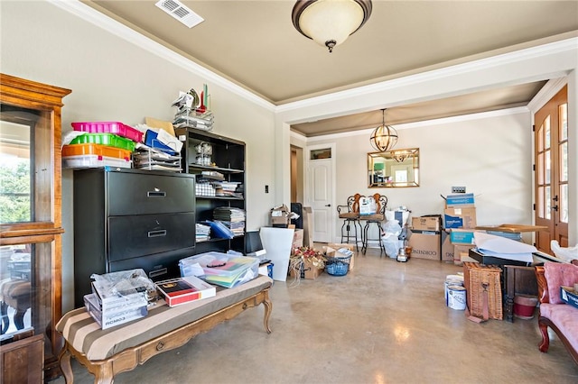 home office featuring concrete floors and crown molding