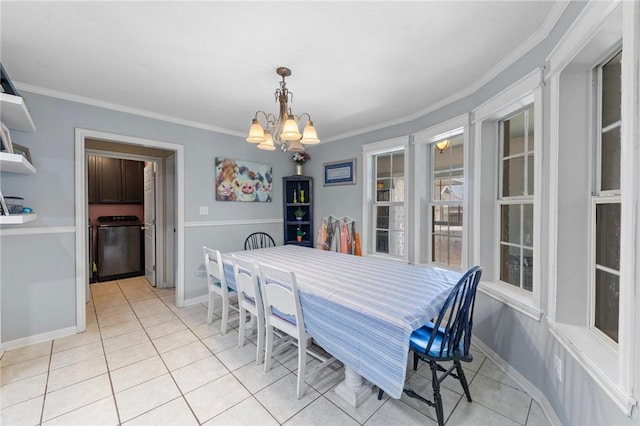 tiled dining area with ornamental molding and an inviting chandelier