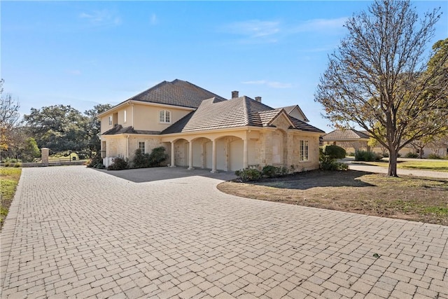 view of front of property with a garage