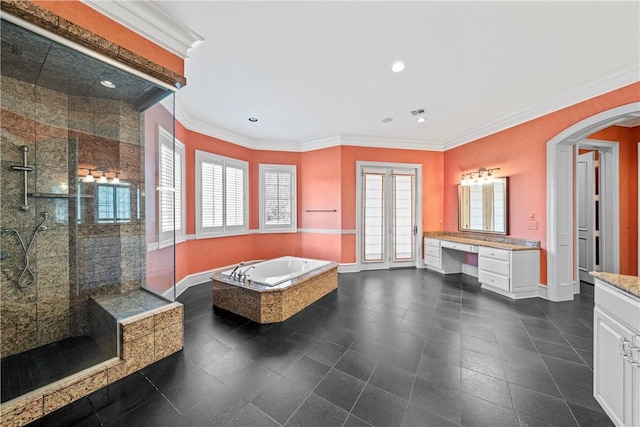 bathroom featuring crown molding, vanity, and shower with separate bathtub