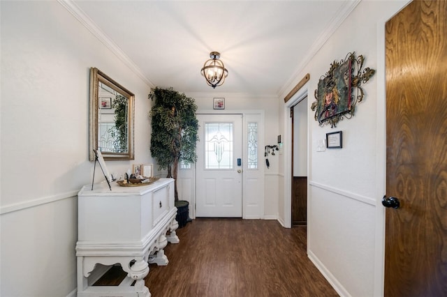 doorway to outside featuring an inviting chandelier, dark hardwood / wood-style floors, and ornamental molding