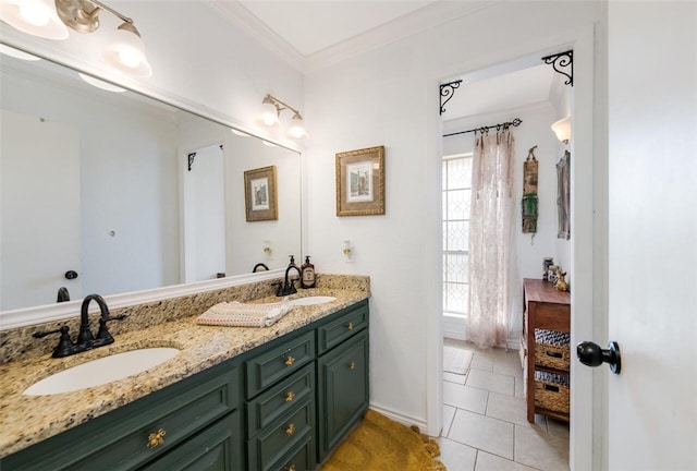 bathroom with tile patterned floors, vanity, crown molding, and a wealth of natural light