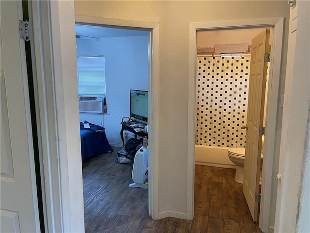 corridor featuring dark hardwood / wood-style floors and cooling unit