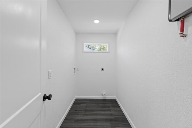 laundry room with dark hardwood / wood-style flooring and hookup for an electric dryer