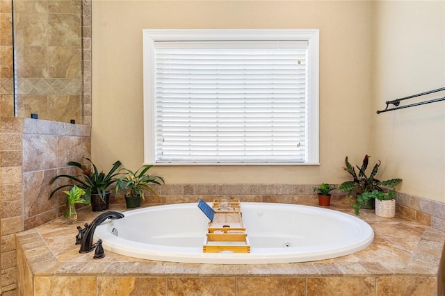 bathroom with tiled tub