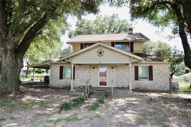 view of front of home featuring a carport