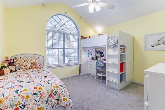 bedroom with baseboards, light colored carpet, a ceiling fan, and vaulted ceiling