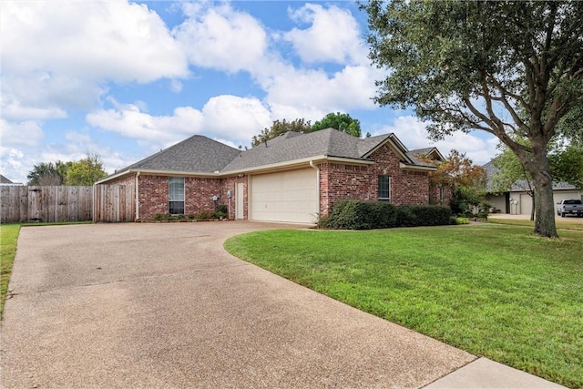 single story home with a front yard and a garage