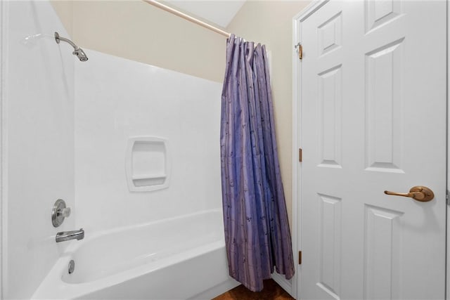 bathroom featuring shower / bathtub combination with curtain