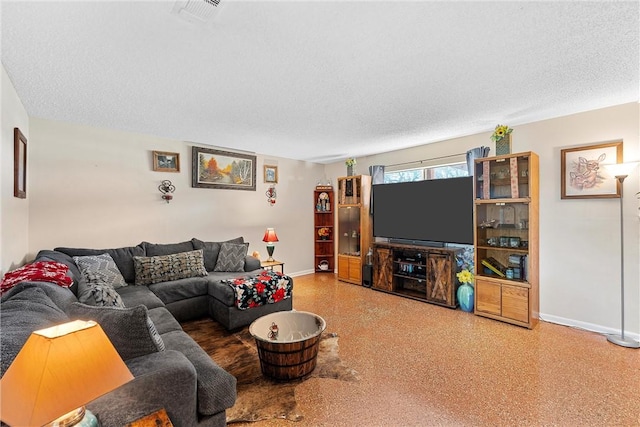 living room with a textured ceiling