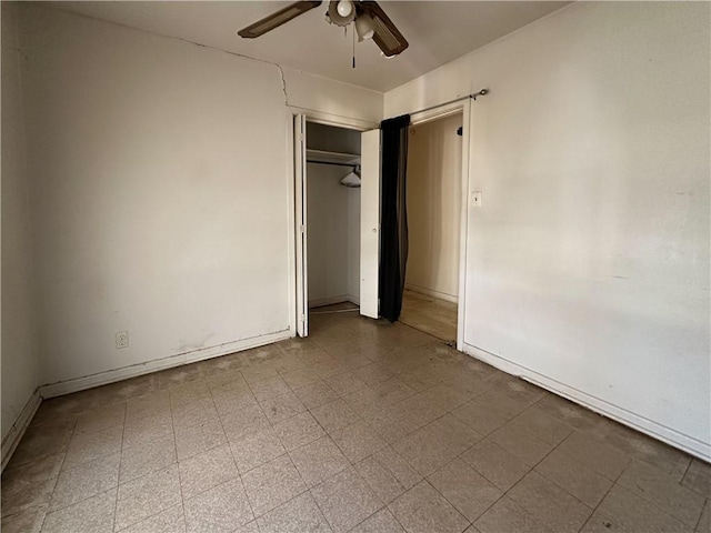 unfurnished bedroom featuring a ceiling fan, a closet, baseboards, and tile patterned floors