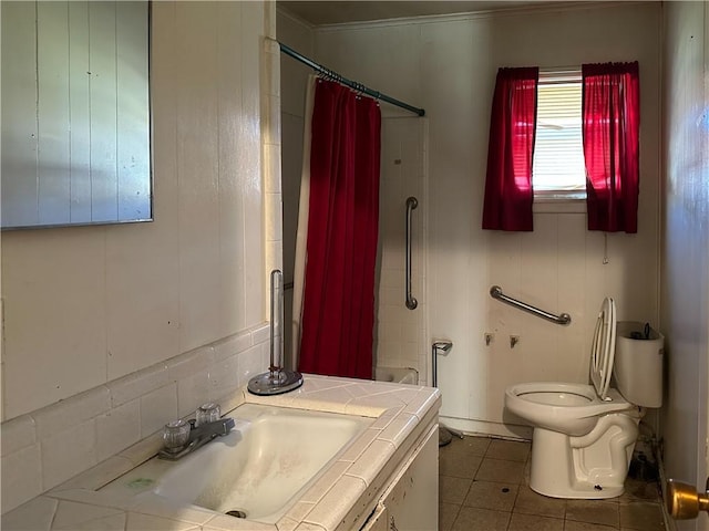 bathroom featuring decorative backsplash, vanity, toilet, and tile patterned floors