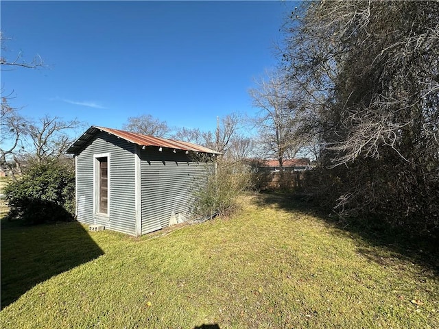 view of yard with an outdoor structure and a storage unit