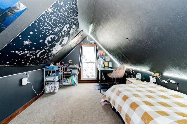 carpeted bedroom featuring vaulted ceiling