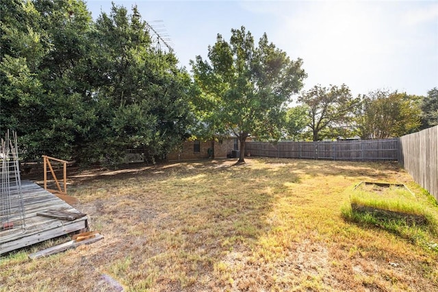 view of yard featuring a wooden deck