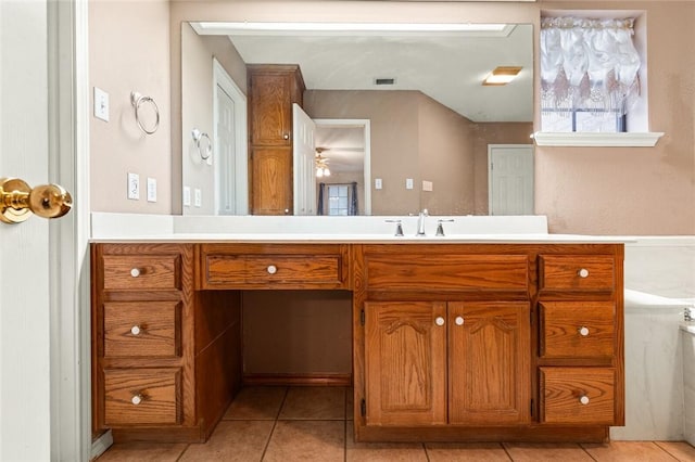 bathroom with ceiling fan, tile patterned flooring, and vanity