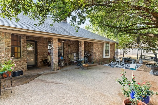 rear view of house with a patio