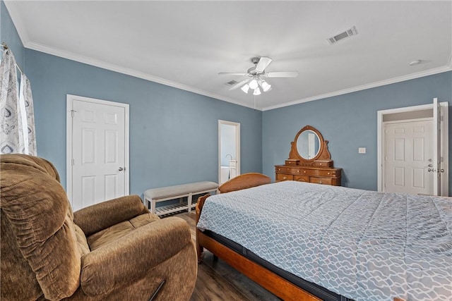 bedroom featuring crown molding, dark wood-type flooring, and ceiling fan