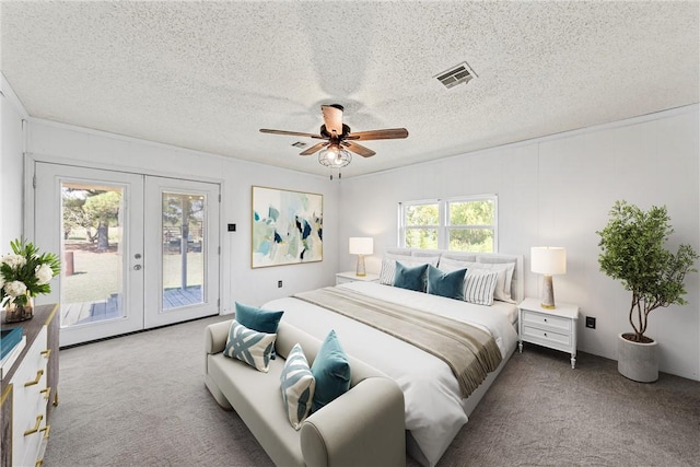 carpeted bedroom with access to exterior, ceiling fan, french doors, and a textured ceiling