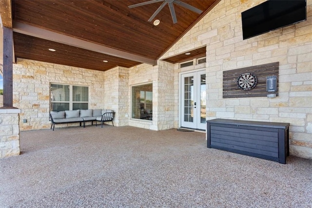 view of patio / terrace with outdoor lounge area, ceiling fan, and french doors