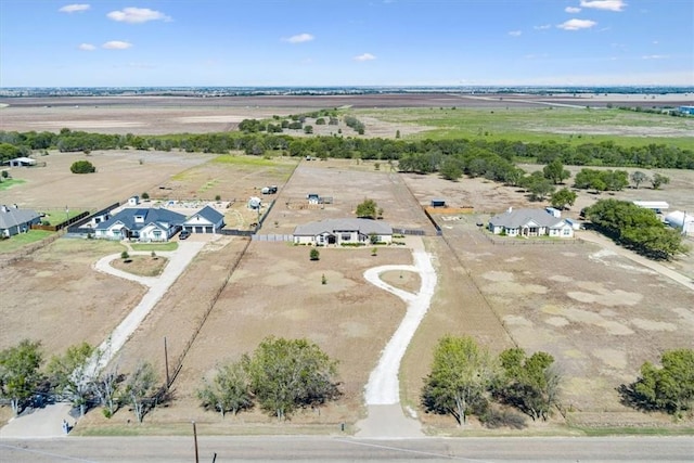 birds eye view of property featuring a rural view