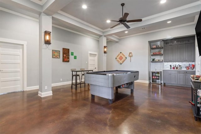 rec room with bar area, ceiling fan, ornamental molding, and billiards