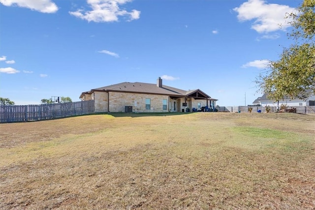 view of yard with central AC