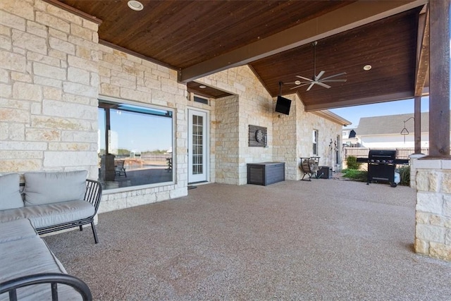 view of patio / terrace with grilling area and ceiling fan