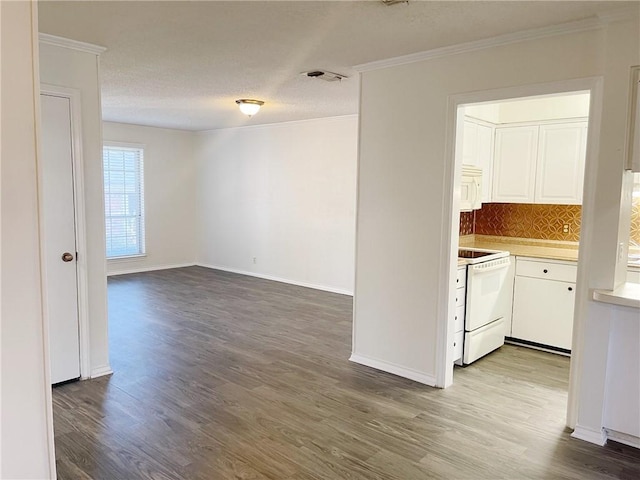 kitchen with white appliances, white cabinetry, light hardwood / wood-style flooring, and ornamental molding