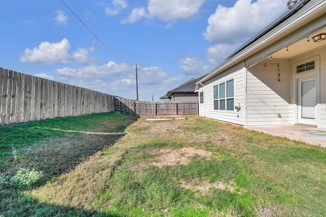 view of yard with a patio area