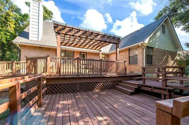 wooden deck featuring a pergola