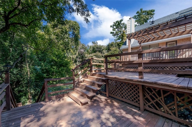 wooden terrace featuring a pergola