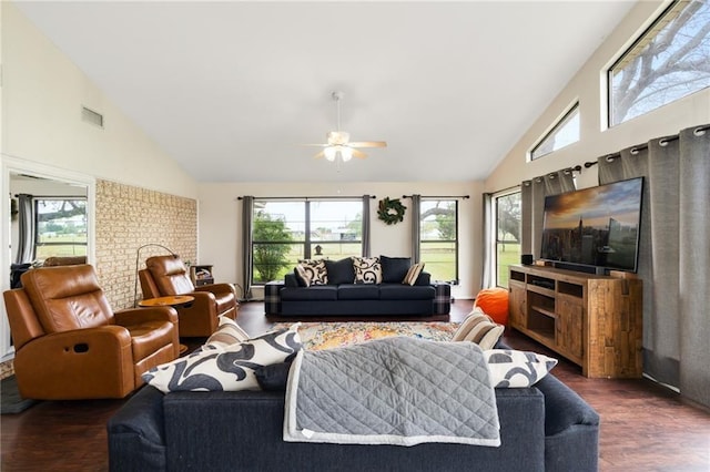 living room featuring wood finished floors, visible vents, and a wealth of natural light